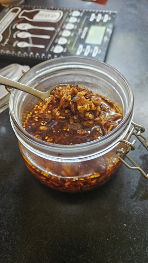 Crispy chilli oil in a glass flip cap top